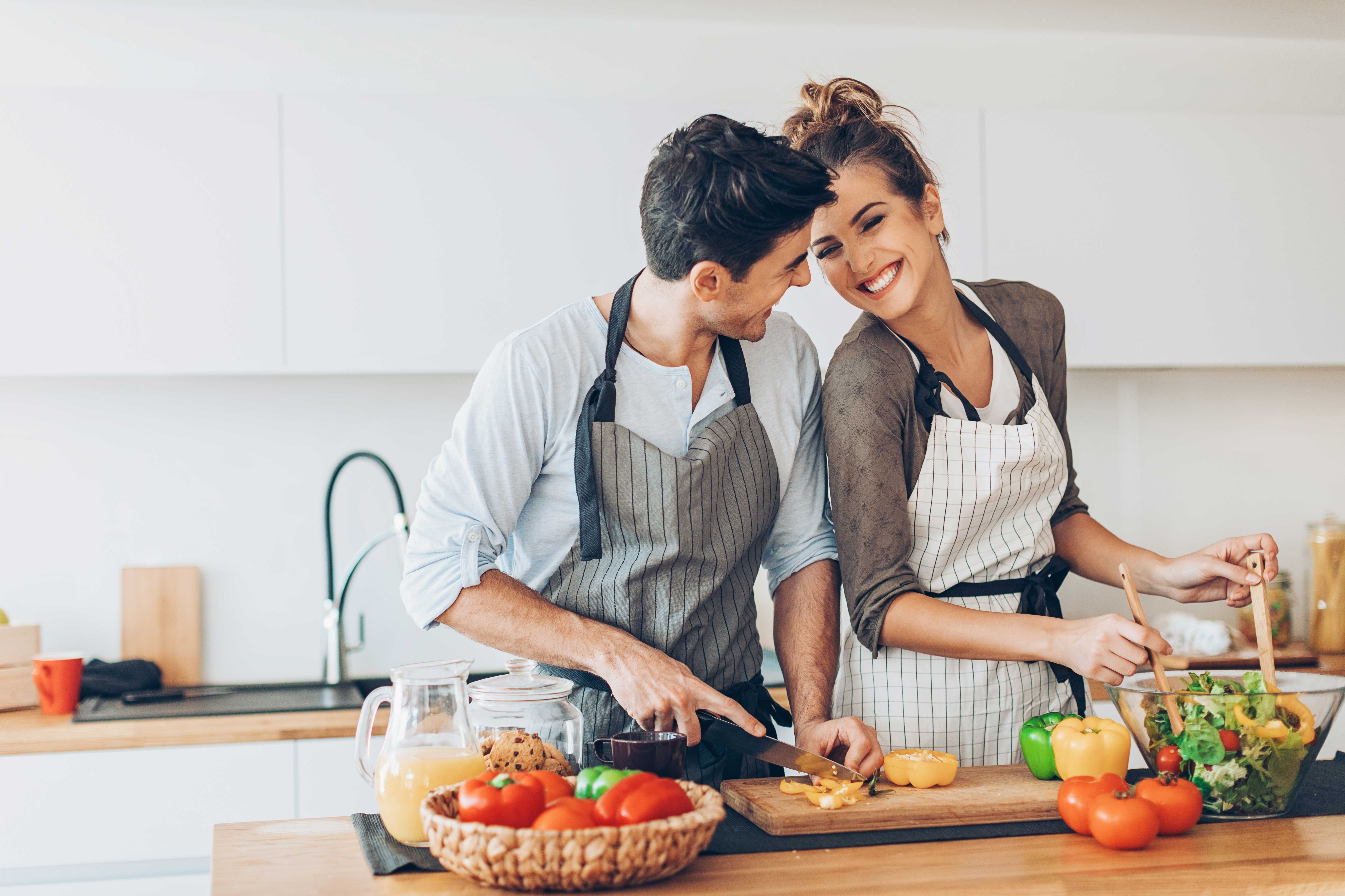 http://www.auburnhomes.ca/wp-content/uploads/2018/10/Happy-Couple-Cooking-in-Kitchen_Web.jpg