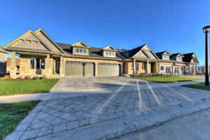 Front of attached condos yellow brick